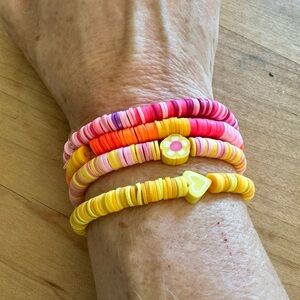 4 piece elastic beaded bracelet sold as set. 💕🌟made by 10 yo for school $.🌟💕